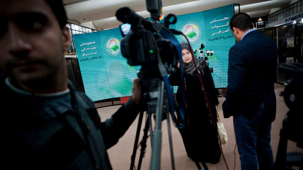 How should Iraq regulate media coverage during elections?